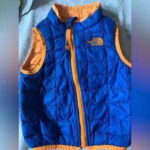 Broncos colored north face vest. Has held up well!